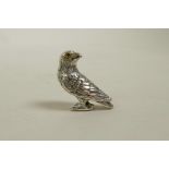 A sterling silver figure of a bird of prey, 1"