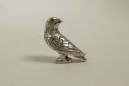 A sterling silver figure of a bird of prey, 1"