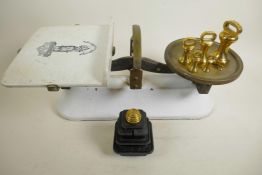 A set of brass and enamelled dairy scales with ceramic pan complete with a set of Salter's