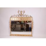 An Adam style giltwood and composition overmantel mirror with scroll and urn decoration, 42" x 44"