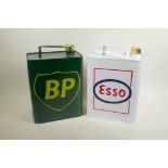 Two enamelled metal petrol cans, 12" high