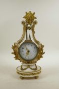 A French marble and ormolu Marie Antoinette lyre shaped clock, the enamel dial decorated with Arabic