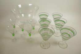 A good quality clear glass pedestal bowl, 8½" x 9¾" wide, together with a set of six vintage conical