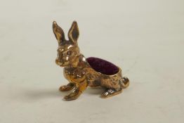 A 925 silver gilt novelty pincushion in the form of a rabbit, 1"