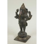 An Indian bronze figurine of Ganesh, 6" high