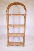 A bamboo and rattan open shelf, 30" x 72"