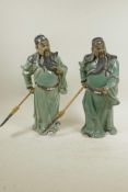 A pair of Chinese, Shiwan style, mud men figures of warriors, 13" high