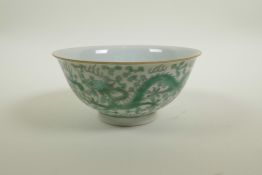 A Chinese porcelain rice bowl with green enamel dragon decoration, 6 character mark to base, 6"