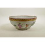 A Chinese famille rose enamel porcelain bowl decorated with brightly robed figures in a landscape,