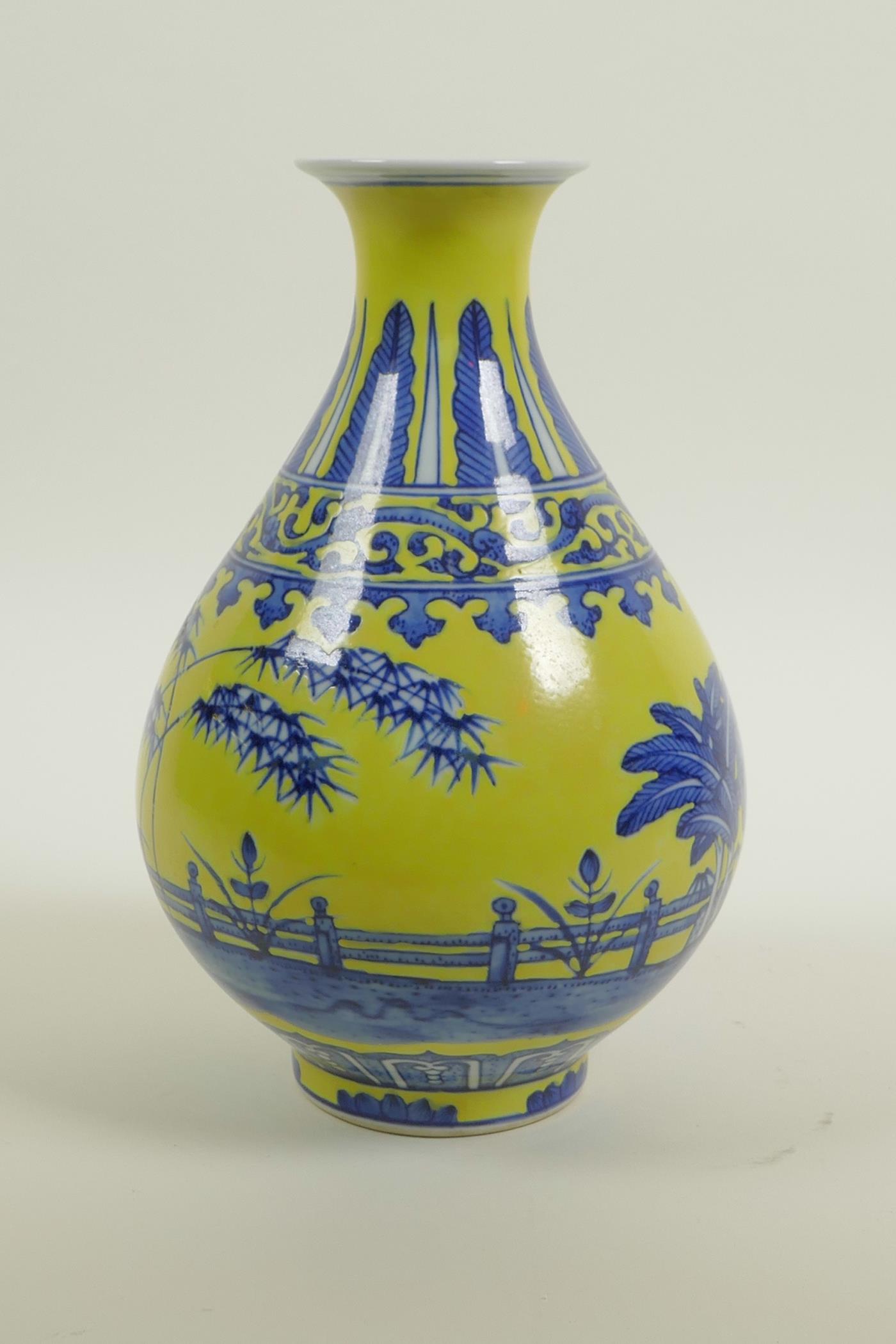 A Chinese yellow glazed porcelain pear shaped vase with blue and white landscape decoration, seal - Image 2 of 4