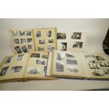 Four Japanese photograph albums containing photographs of socio-historical interest, largest 13" x
