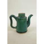 An Oriental green crackle glazed earthenware teapot, lacks cover, 5" high