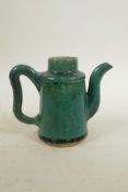 An Oriental green crackle glazed earthenware teapot, lacks cover, 5" high
