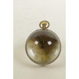 A glass and brass desk top ball clock, 2" diameter