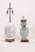 A bronze table lamp in the form of an archaic Chinese vase, 14" high, and a Chinese porcelain lamp