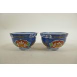 A pair of Korean porcelain rice bowls with floral decoration in the Imari pallette, signed to