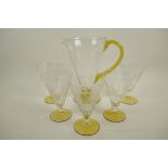 A vintage glass lemonade set of jug and five glasses of conical form, with engraved fern leaf