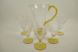 A vintage glass lemonade set of jug and five glasses of conical form, with engraved fern leaf