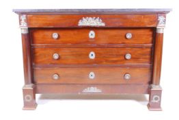 A Regency mahogany marble topped commode with brass mounts and four graduated drawers flanked by two