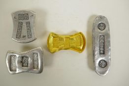 Three Chinese white metal trade ingots and a similar gilt metal ingot, largest 3½"