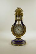 A V&A Museum 'Marie-Antoinette' blue and gilt porcelain mantel clock in the form of a lyre, 15"