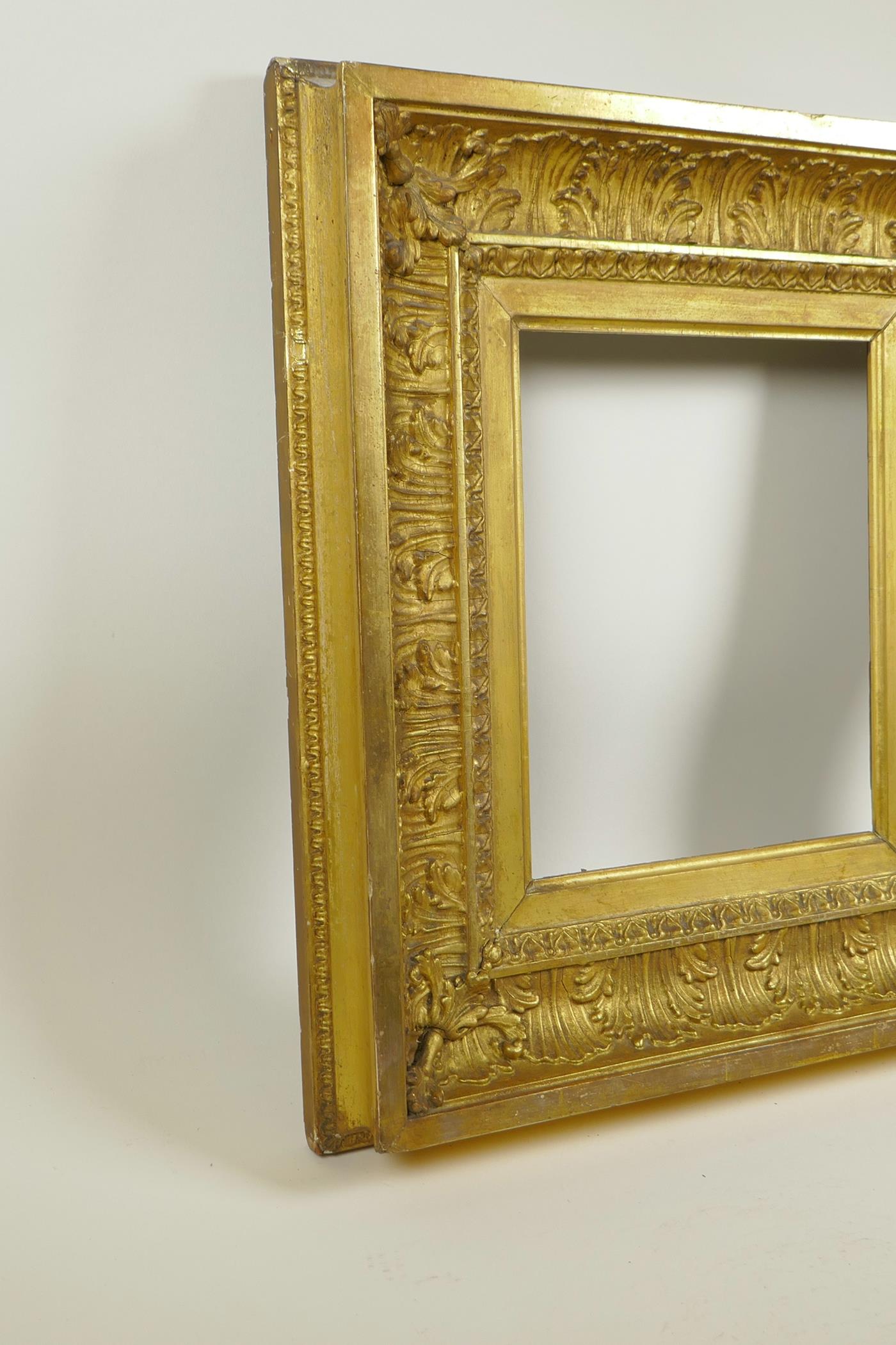 A C19th gilt composition picture frame, with leaf and scroll decoration, rebate 10" x 8¼" - Image 2 of 3