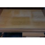 A contemporary oak desk, with pull out drawer and fold flat front, 52" x 26" x 30½"