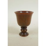 A Chinese turned faux horn stem cup, 3½" high