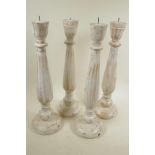 Four painted and distressed turned wood pricket candlesticks, 18" high