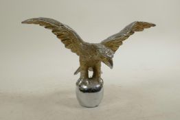 A plated metal car mascot in the form of an eagle, 9" wide