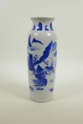 A Chinese blue and white vase decorated with warriors and travellers in a landscape, 10½" high