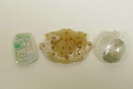Three Chinese jade and hardstone pendants with carved dragon and phoenix decoration, largest 3" x 2"