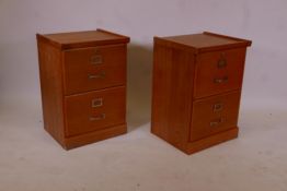 A pair of contemporary two drawer oak filing cabinets with brass handles, 19" x 17" x 28"
