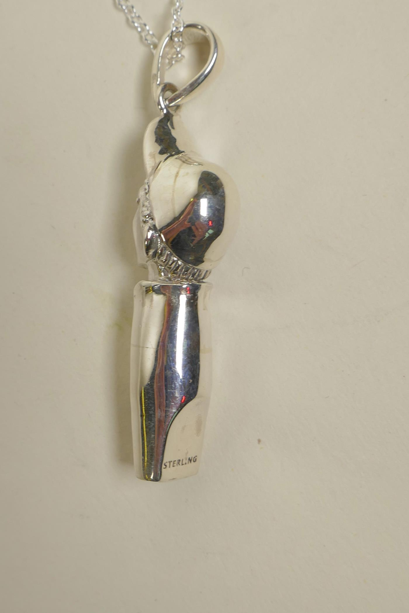 A sterling silver whistle in the form of a boy, 1½" long - Image 2 of 2