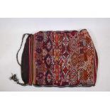 A large woven woolen saddle bag woven with geometric patterns, 48" x 34"