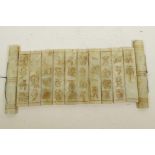 A Chinese hardstone tablet scroll carved with symbols, 11" x 5½"