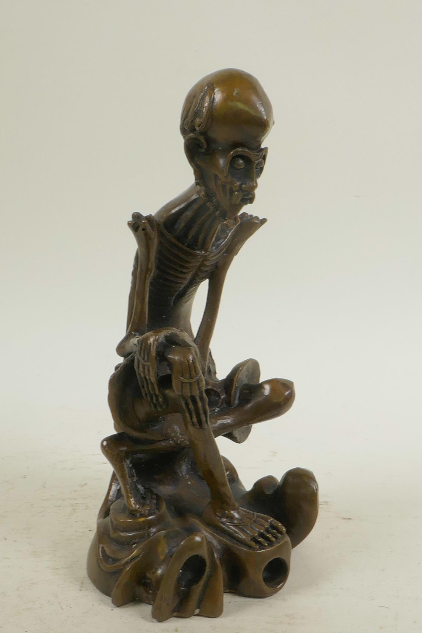 A bronze figure of a skeletal man, 8½" high - Image 2 of 7