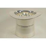 A silver plated 'top hat' wine coaster, 7" high