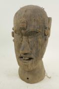 An African carved wood head bust with nail decoration, 10½" high