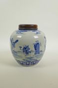 A late C19th/early C20th Chinese blue and white porcelain ginger jar and hardwood cover, decorated