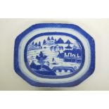A Chinese blue and white porcelain meat dish with riverside landscape decoration, 15" x 12"