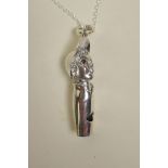 A sterling silver whistle in the form of a boy, 1½" long