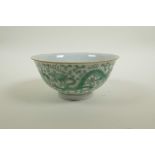 A Chinese porcelain rice bowl with green enamel dragon decoration, 6 character mark to base, 6"