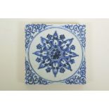 A Chinese blue and white porcelain pottery tile with Yin Yang decoration, 8" x 8"