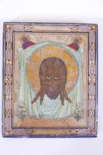 A C19th Russian acheiropoieton ("made without hands") icon, depicting Christ the Saviour, painted on