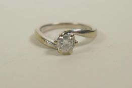 A 9ct white gold and diamond set engagement ring, approximate size 'O'