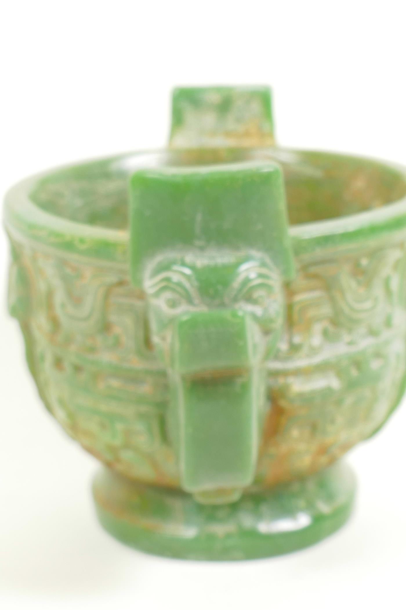 A Chinese carved green hardstone censer with two mask handles on pedestal base carved with birds and - Image 4 of 5