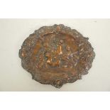 A small copper plaque embossed with playful putti, 7½" x 6"