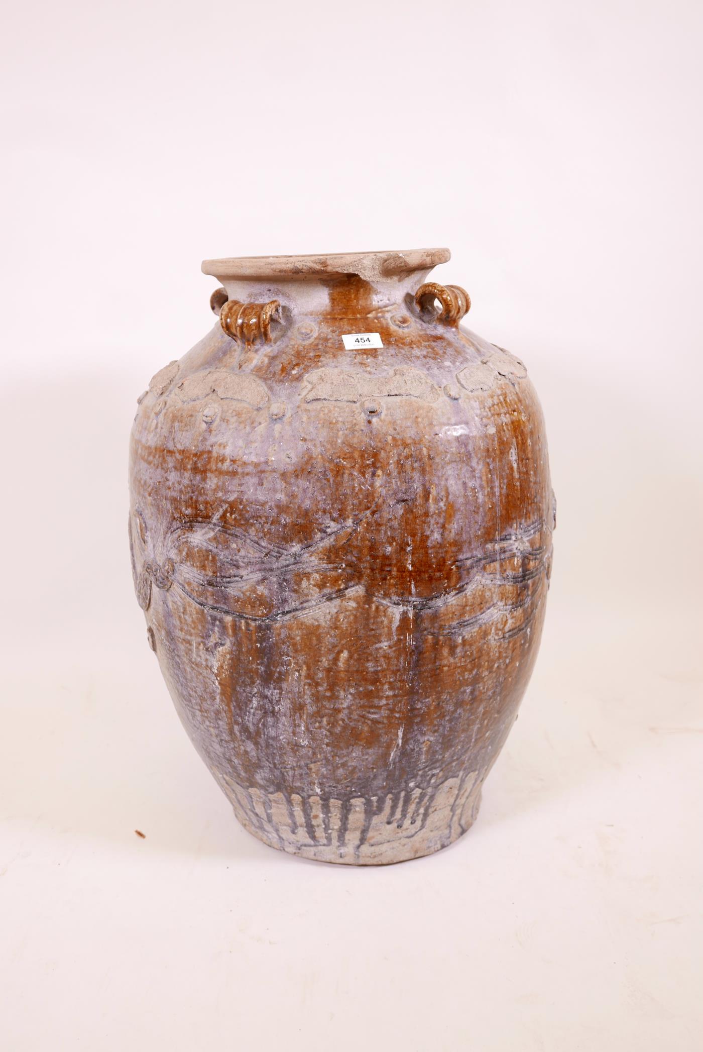 A large Chinese treacle glazed jar with four moulded ring handles, 26" high - Image 2 of 5