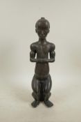 A naive bronze nude figure, 14½" high